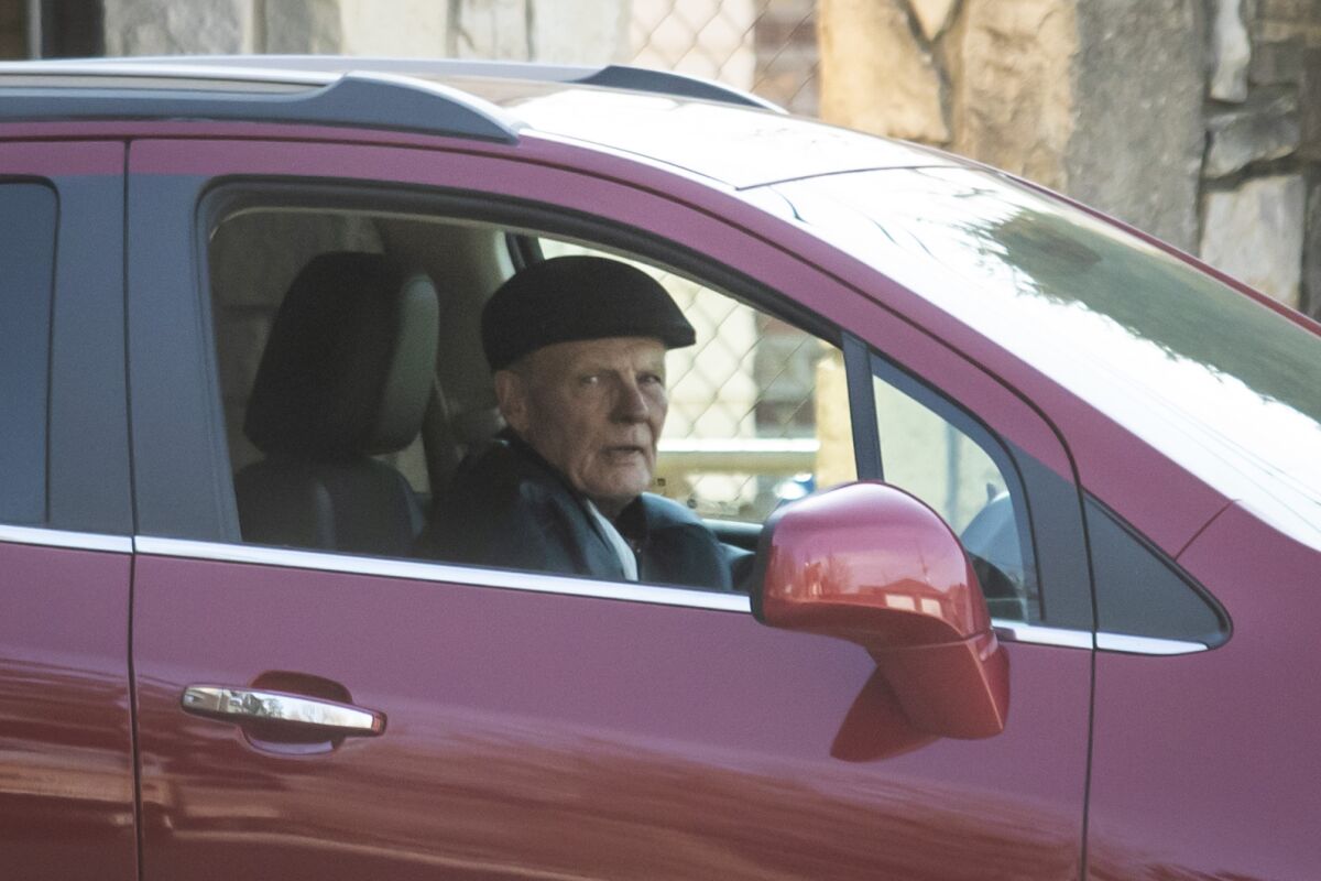 FILE - Former Speaker of the House Michael Madigan parks in the garage at his Southwest Side home, Wednesday afternoon, March 2, 2022, in Chicago. Madigan, who held a virtual lock on Statehouse power for most of the past four decades, pleaded not guilty Wednesday, March 9, 2022, to multiple counts of racketeering and bribery in what prosecutors say was a long-running enterprise to amass riches and stockpile power. (Ashlee Rezin/Chicago Sun-Times via AP)