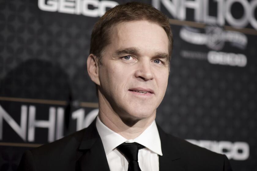 Luc Robitaille arrives at the The NHL100 Gala held at the Microsoft Theater on Friday, Jan. 27, 2017, in Los Angeles. (Photo by Richard Shotwell/Invision/AP)