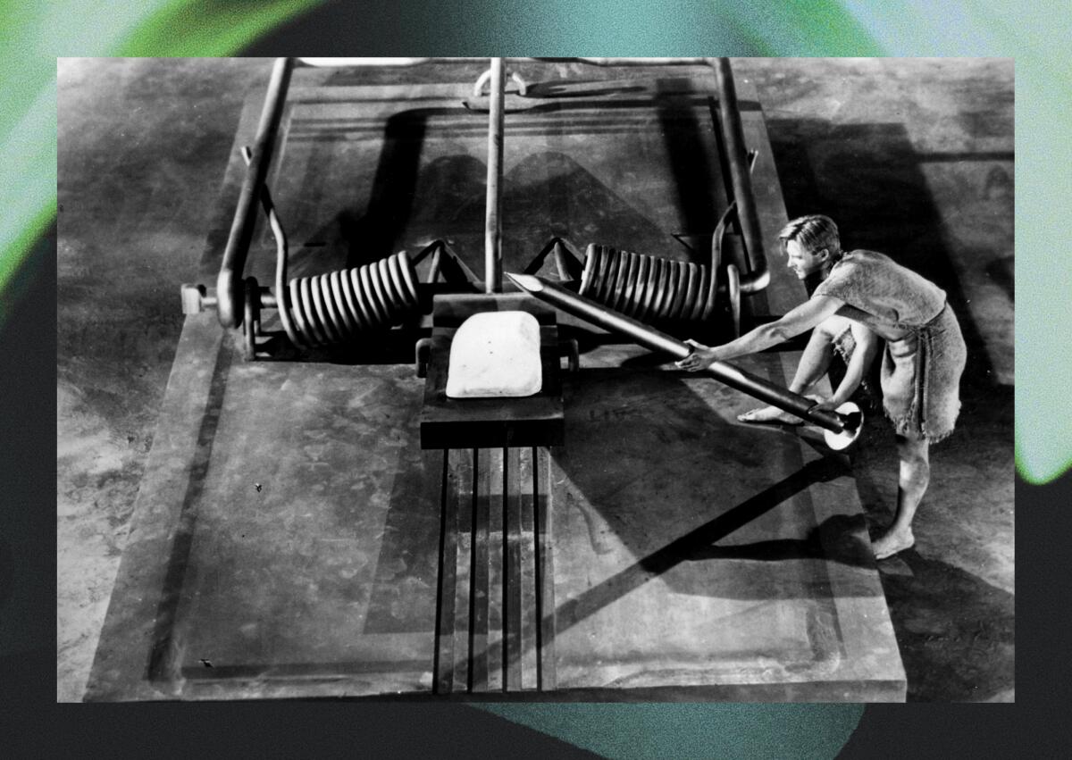 A very small man operates a mouse trap using a pencil in 1957. "The Incredible Shrinking Man."