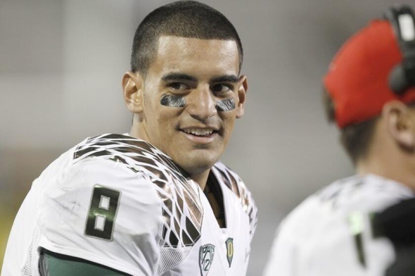 Oregon quarterback Marcus Mariota has lit up opposing defenses for 1,358 yards and 14 touchdowns with no interceptions for the Ducks through five games this season.