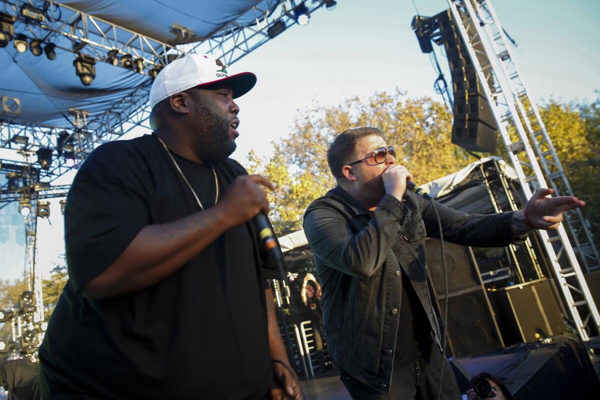 Incendiary rap duo Run the Jewels' Killer Mike, left, and El-P are a must-see performance at the music festival.