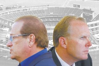 Chargers President Dean Spanos and San Diego Mayor Kevin Faulconer.