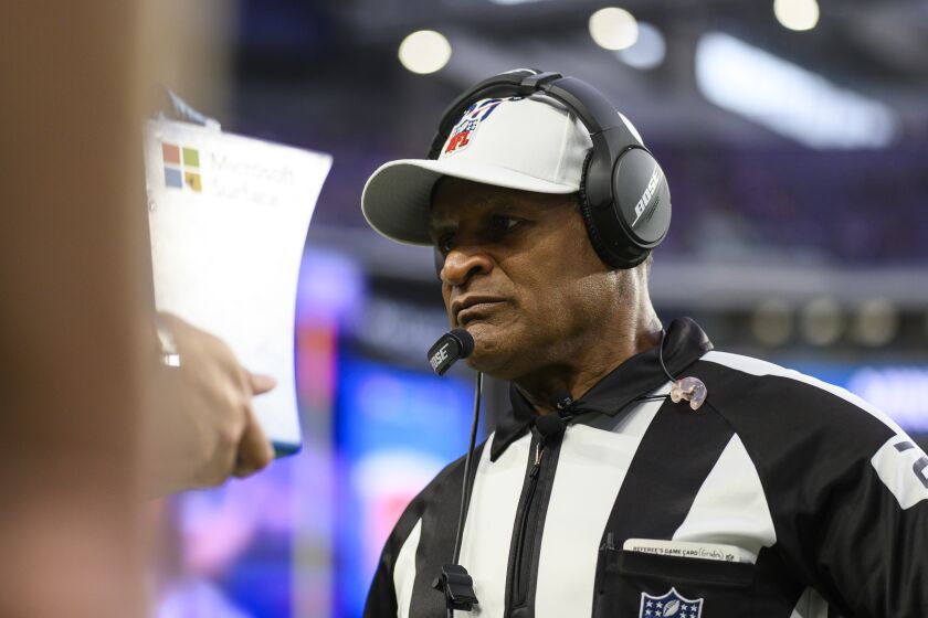 MINNEAPOLIS, MN - SEPTEMBER 22: Referee Jerome Boger checks the replay system before the game between the Oakland Raiders and Minnesota Vikings at U.S. Bank Stadium on September 22, 2019 in Minneapolis, Minnesota. (Photo by Stephen Maturen/Getty Images)