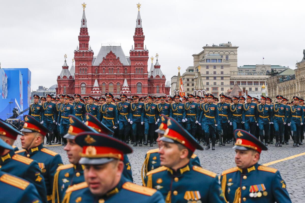 Russian soldiers march during the Victory Day military parade in Red Square in Moscow on Sunday, May 9, 2021.