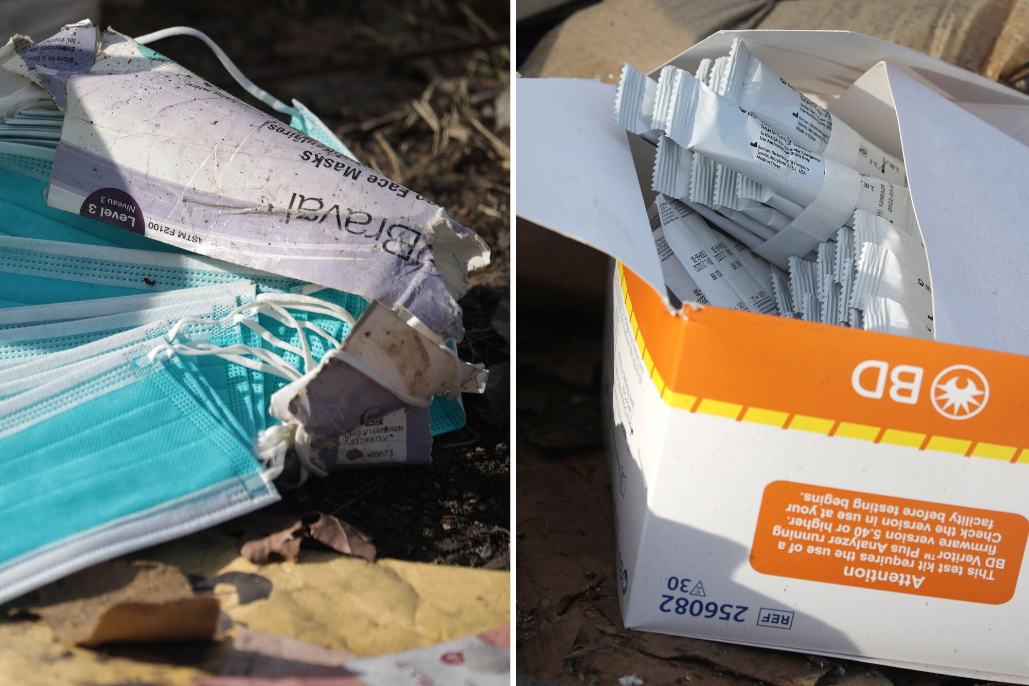 Discarded boxes of face masks and COVID tests.