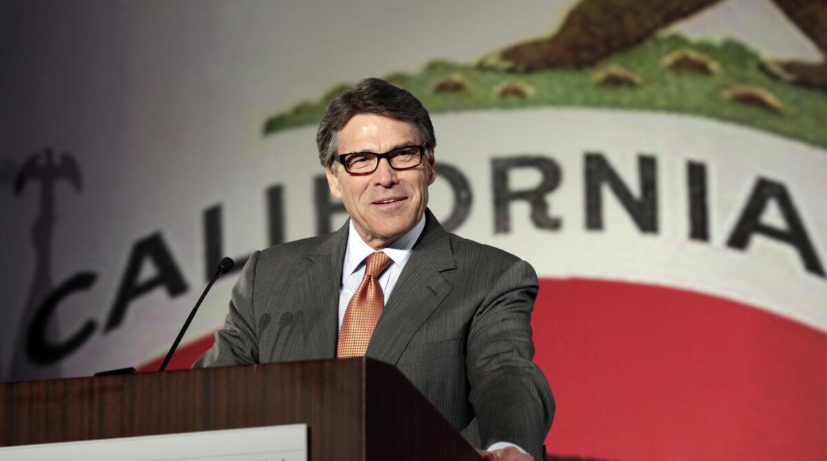 Texas Gov. Rick Perry, who said he might move to California, gives the keynote speech at the California Republican Party convention in Anaheim.
