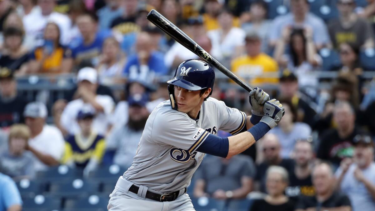 The Milwaukee Brewers' Christian Yelich bats in a 2019 game against the Pittsburgh Pirates.