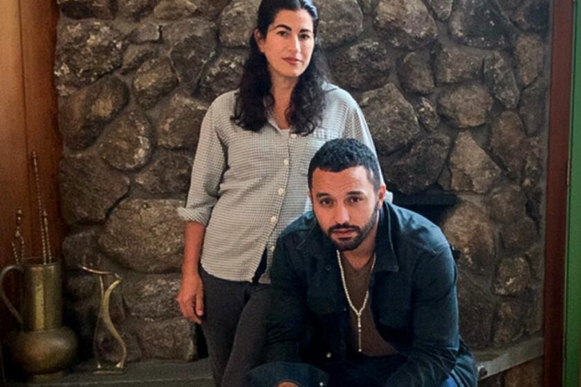 Jehane Noujaim and Karim Amer, seated, were photographed in Boston via FaceTime.