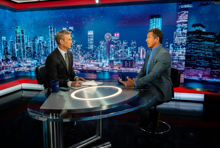 Dan Abrams and Chris Cuomo at the NewsNation studios in New York.