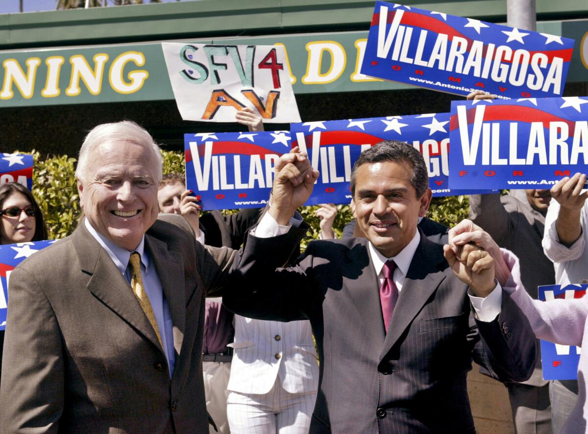 Former Los Angeles mayor Richard Riordan, left, shows his support for mayoral candidate Antonio Villaraigosa in 2005.