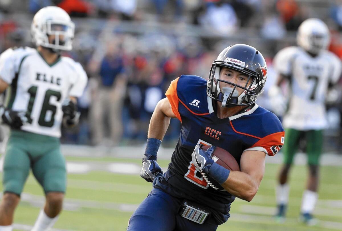 Orange Coast College wide receiver Joey Cox sprints toward the end zone for a touchdown.