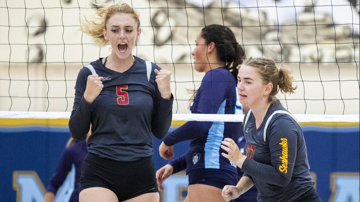 Ocean View High's Helen Reynolds, left, pictured celebrating at Marina on Aug. 22, lost at Temecula Linfield Christian in the semifinals of the CIF Southern Section Division 7 playoffs on Saturday.