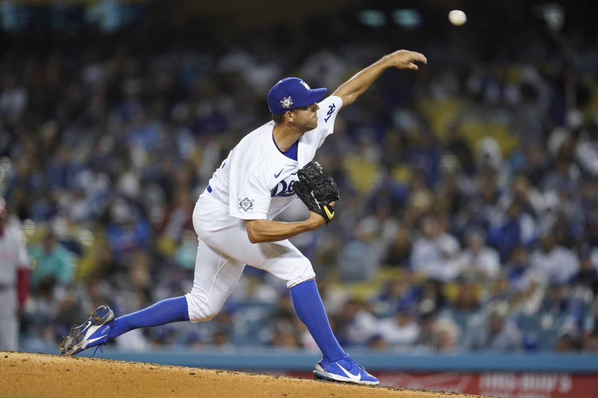 Dodgers relief pitcher Tyler Anderson throws during the fourth inning of a 3-1 win over the Cincinnati Reds on Friday.