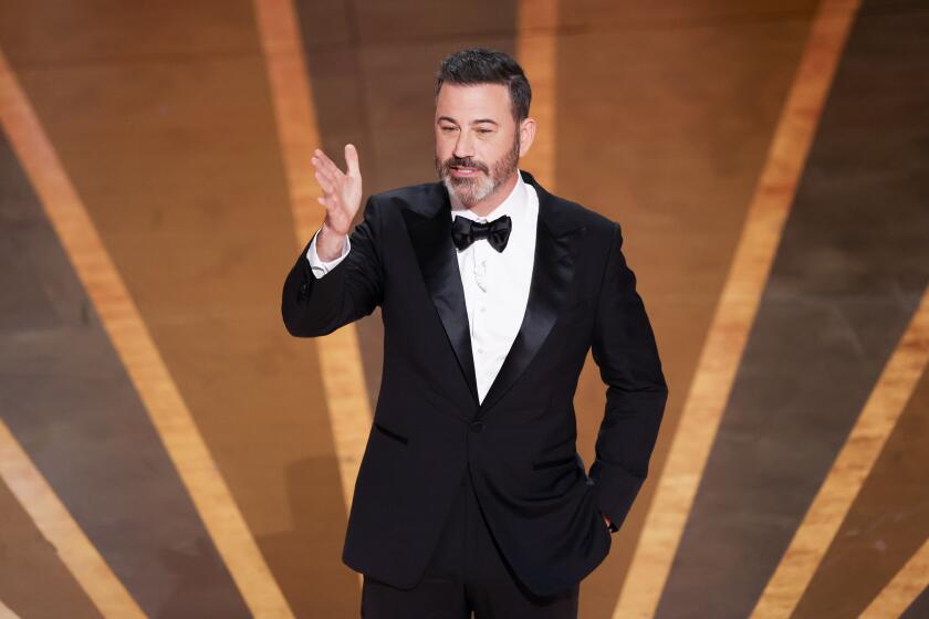 HOLLYWOOD, CA - MARCH 12: Jimmy Kimmel delivers his opening monologue at the 95th Academy Awards in the Dolby Theatre on March 12, 2023 in Hollywood, California. (Myung J. Chun / Los Angeles Times)