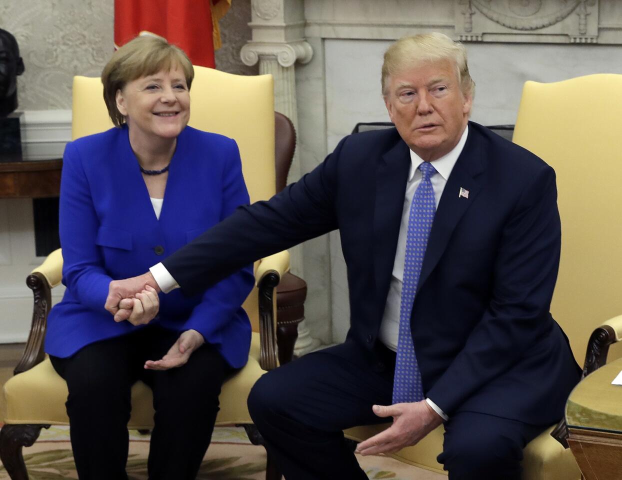 President Donald Trump meets with German Chancellor Angela Merkel in the Oval Office of the White House on April 27, 2018, in Washington.
