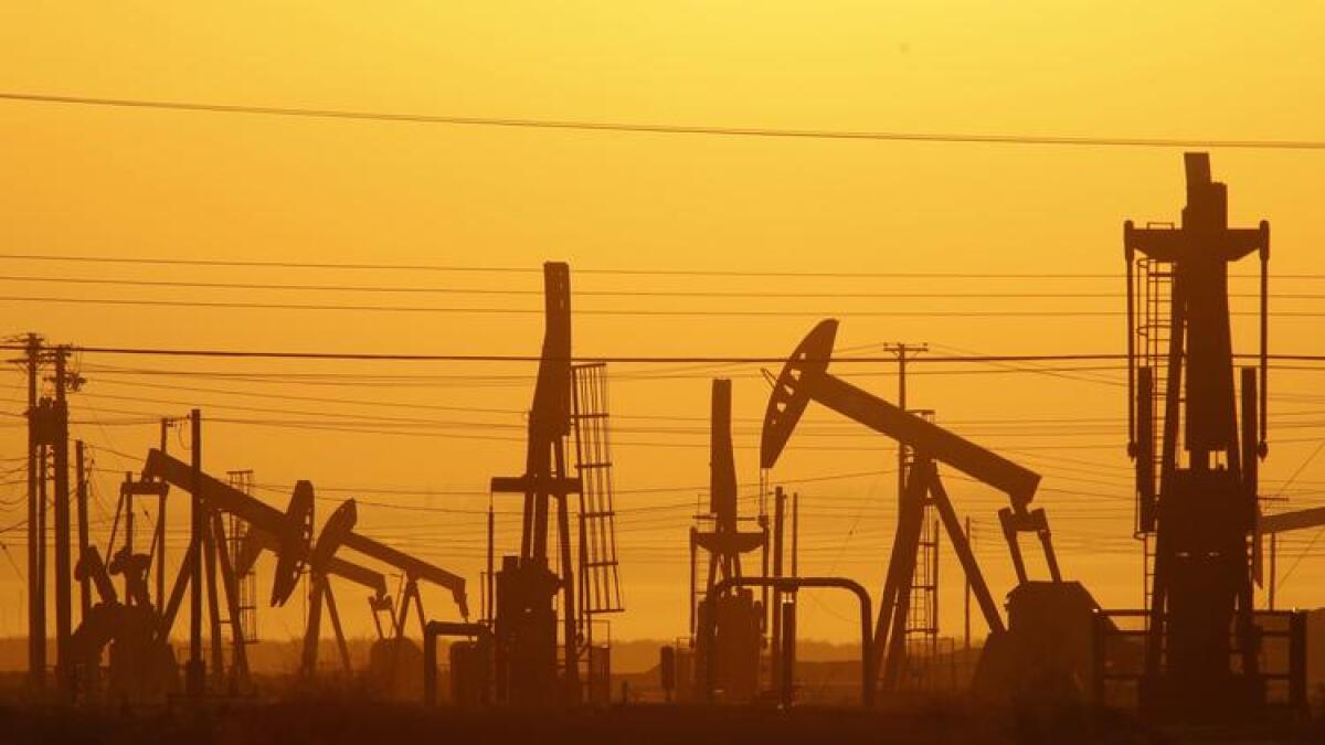 Pump jacks draw petroleum from the ground in an oil field over the Monterey Shale formation in Kern County.
