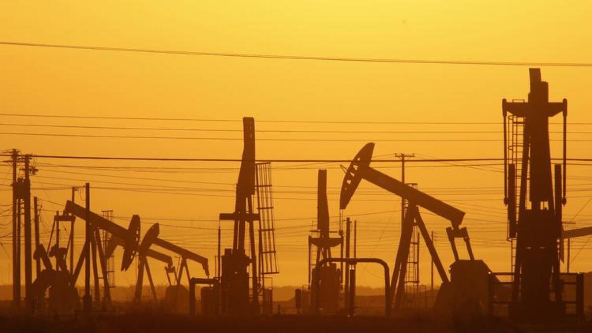 Pump jacks draw petroleum from the ground in an oil field over the Monterey Shale formation in Kern County.