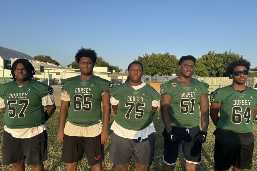 Dorsey's big offensive line: Chris Barnett (left), King Jackson, Derek Armstrong, Mike McDonald, Alonzo Holmes.