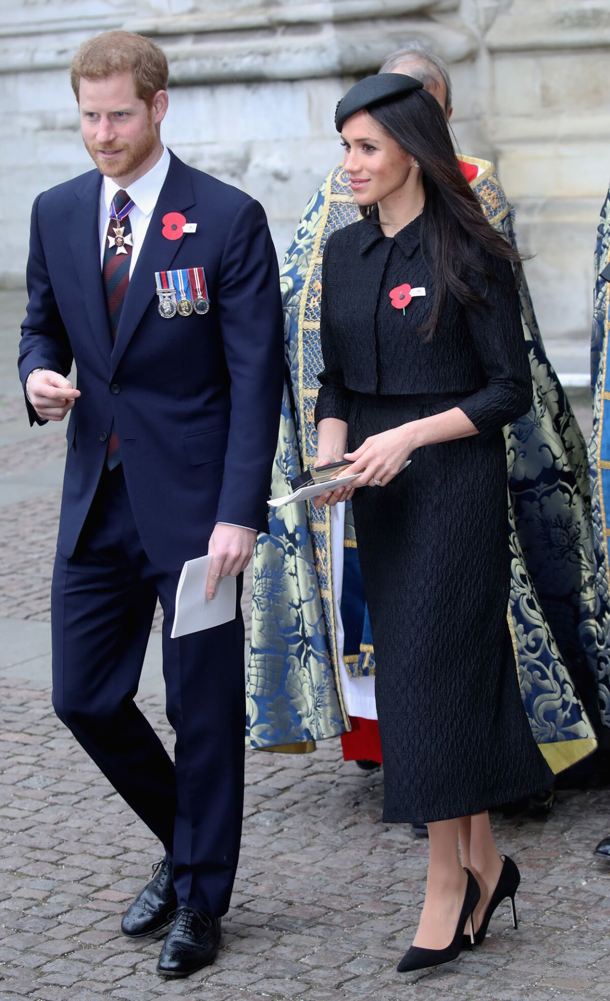 Prince Harry and Meghan Markle depart after attending an Anzac Day Service of Commemoration and Thanksgiving at Westminster Abbey.