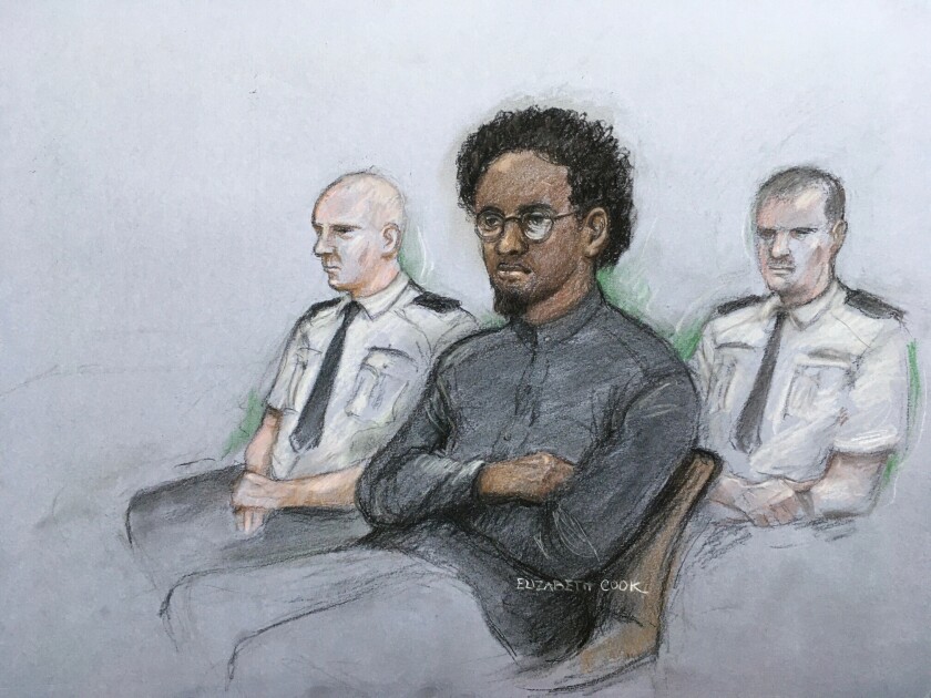 This court artist sketch by Elizabeth Cook shows Ali Harbi Ali in the dock at the Old Bailey accused of stabbing to death Conservative MP for Southend West David Amess, in London, Monday March 21, 2022. A prosecutor says a man who stabbed a veteran British lawmaker to death while he was meeting voters last year was a “committed Islamist terrorist” who had spent years researching and planning potential attacks on lawmakers. Ali Harbi Ali, 26, appeared in the dock Monday at London’s Central Criminal Court as a trial opened into the murder of Conservative lawmaker David Amess. (Elizabeth Cook/PA via AP)