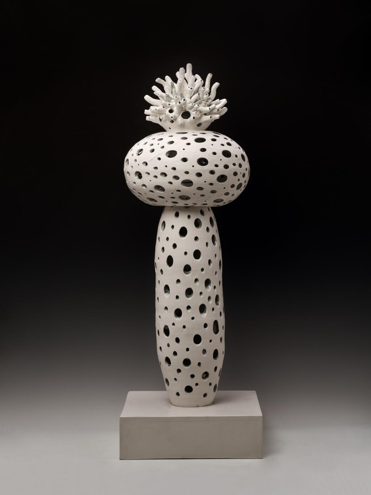 A white ceramic piece evokes coral.