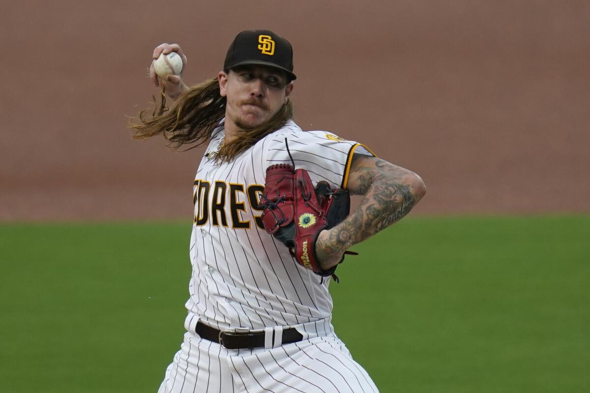 San Diego Padres starting pitcher Mike Clevinger delivers against the Colorado Rockies on Sept. 8.