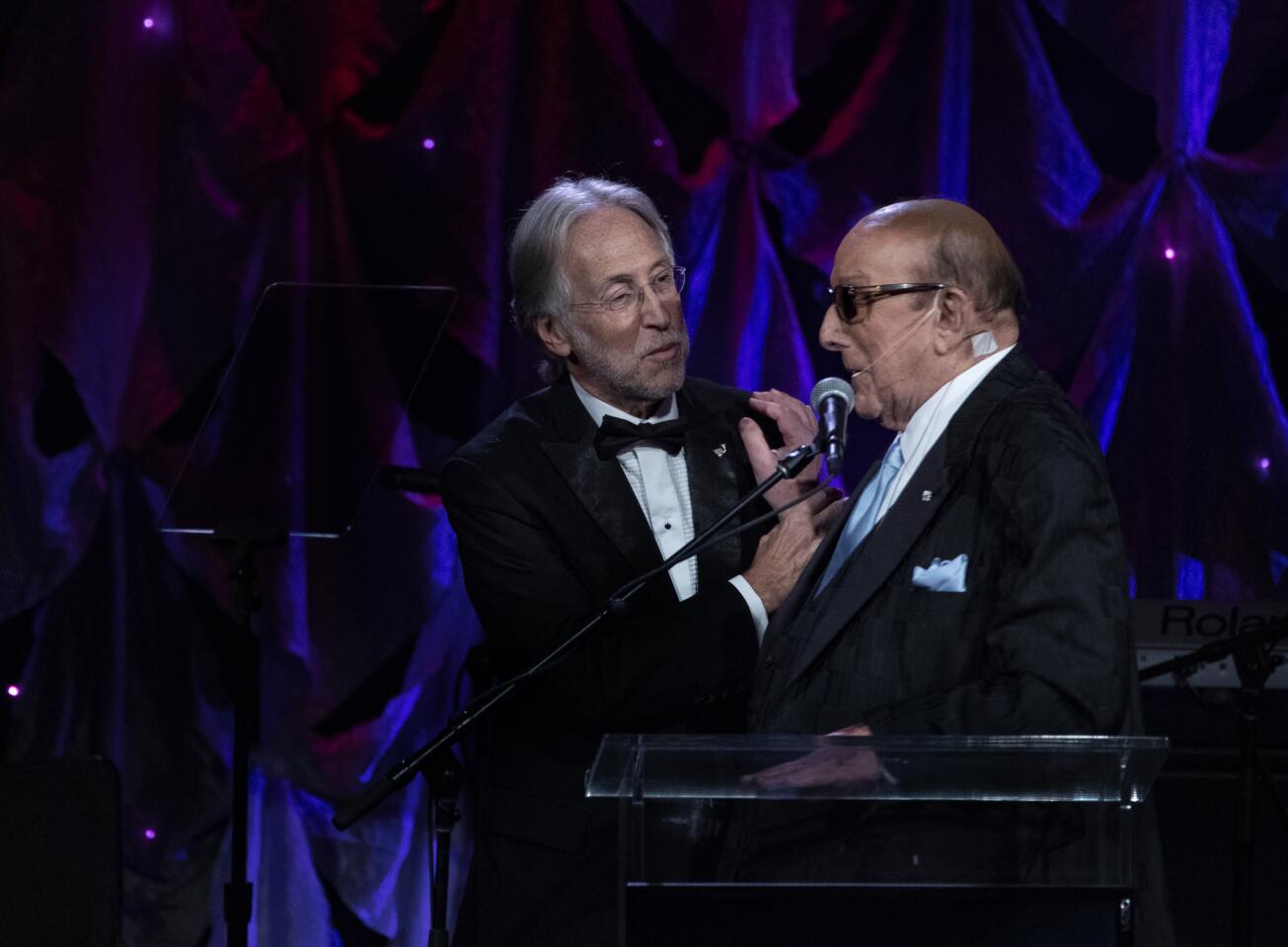 Recording Academy President Neil Portnow, left, and Clive Davis at the record executive’s annual pre-Grammy gala Saturday at the Beverly Hilton.