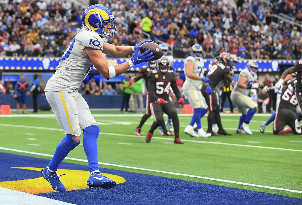 Cooper Kupp catches a touchdown pass  from Matthew Stafford in the second quarter. 