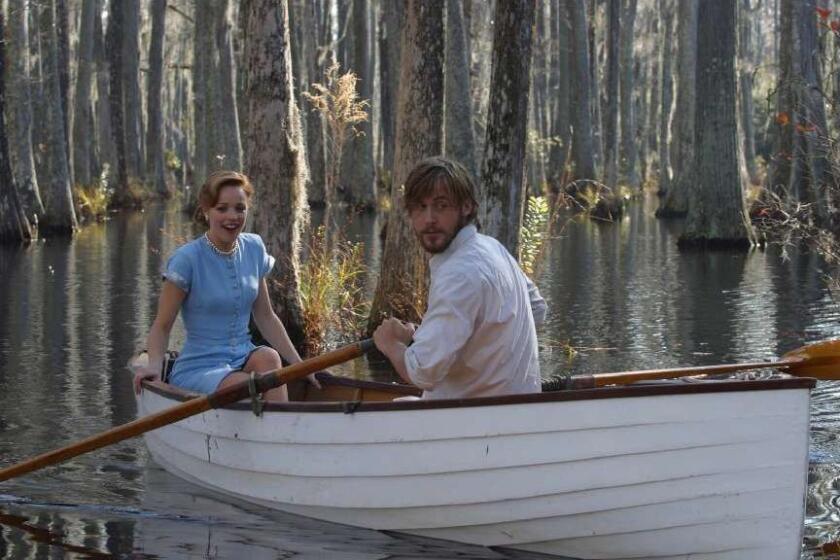 Rachel McAdams as Allie and Ryan Gosling (left) as Noah in "The Notebook." An epic story of love lost and found from New Line Productions. (AP Photo/Melissa Moseley/New Line Productions)