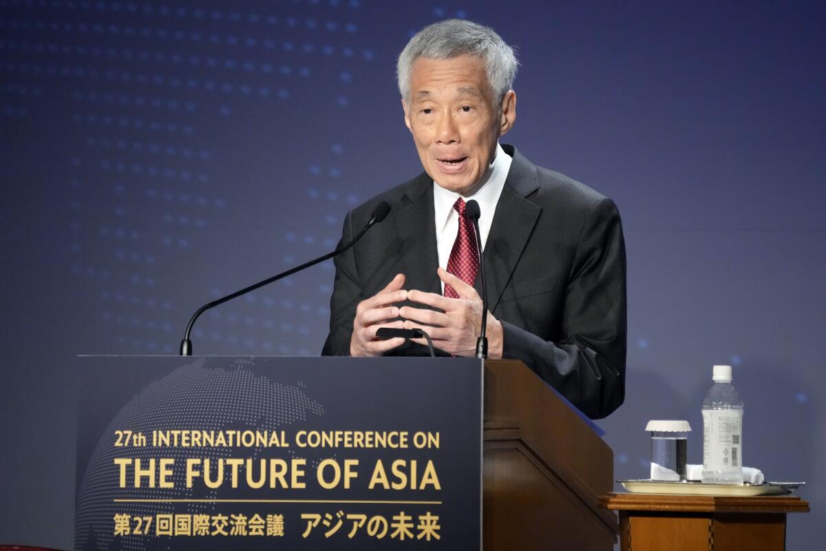 Singapore Prime Minster Lee Hsien Loong speaks at a conference.