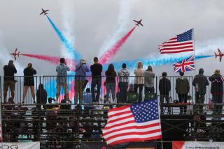 Spectators watch the Royal Air Force Red Arrows perform during the second day of the MCAS Miramar Air Show, September 28, 2019 in San Diego.