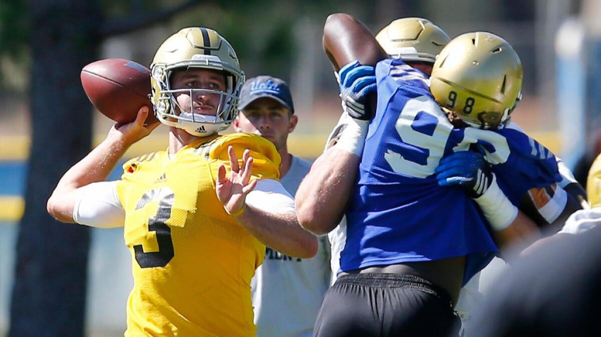 UCLA quarterback Josh Rosen looks to throw during a practice at California State San Bernardino on Aug. 15.
