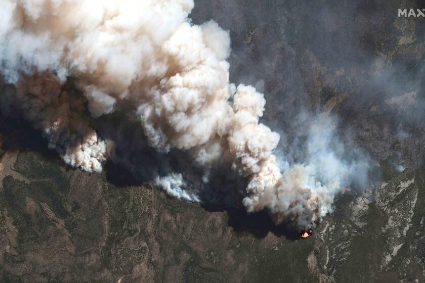 FILE - This satellite image provided by Maxar Technologies shows the active fire lines of the Hermits Peak wildfire, in Las Vegas, N.M., May 11, 2022. More than 5,000 firefighters are battling multiple wildland blazes in dry, windy weather across the Southwest. Evacuation orders remained in place Thursday, May 19, 2022, for residents near fires in Texas, Colorado and New Mexico. (Satellite image ?2022 Maxar Technologies via AP, File)