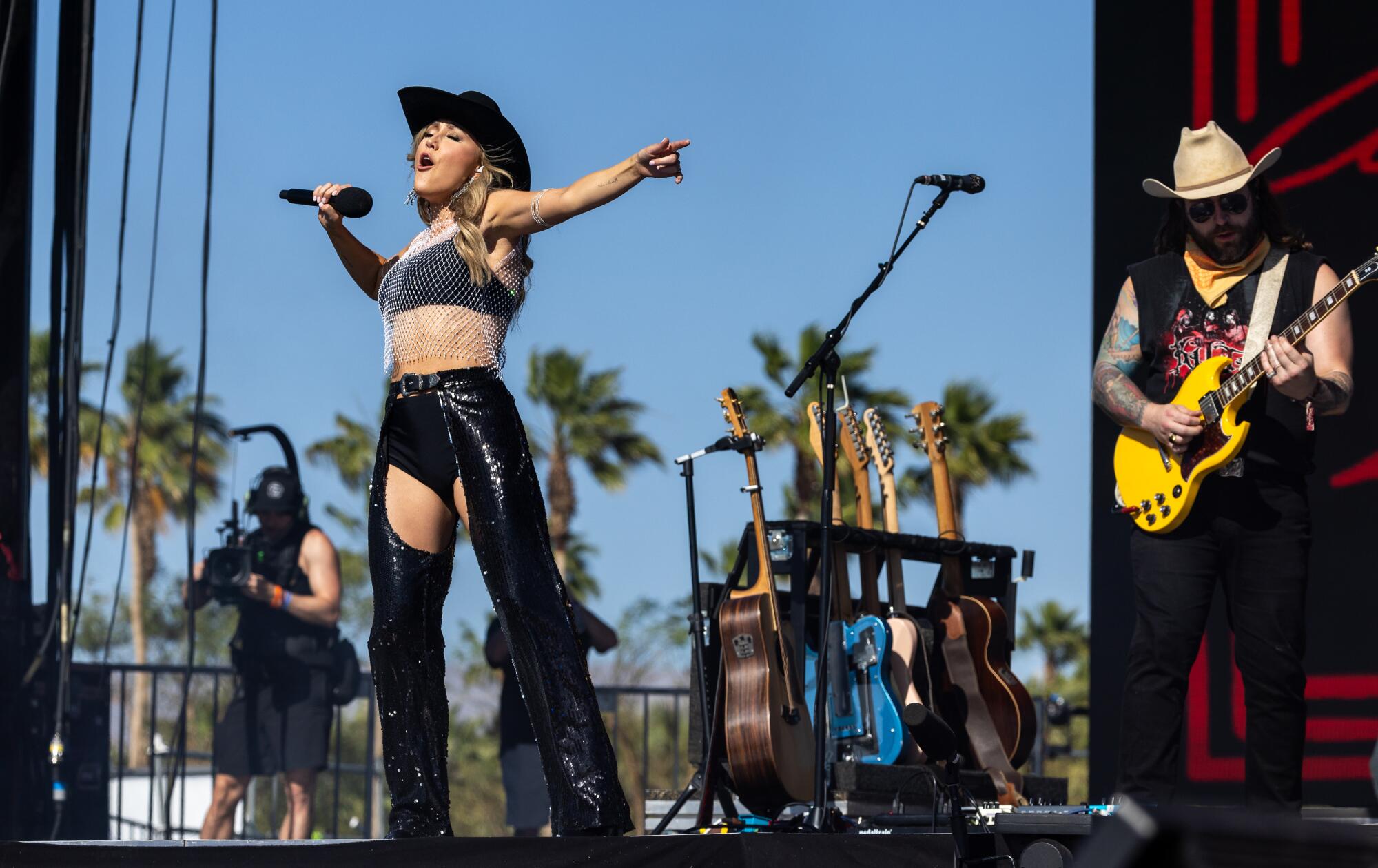 Maddie Marlow of Maddie & Tae performs on the Mane Stage