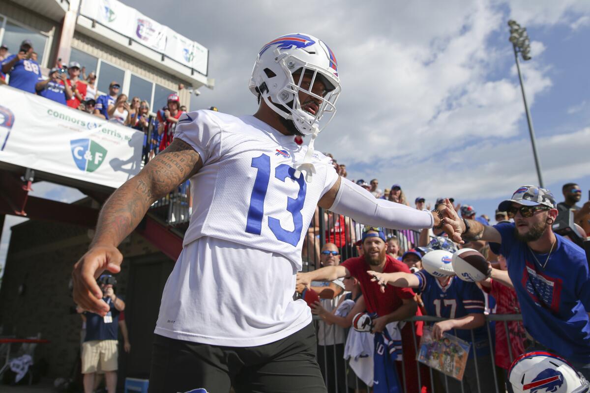Buffalo Bills wide receiver Gabriel Davis (13) takes the field for practice at the NFL football team's training camp in Pittsford, N.Y., Monday July 25, 2022. (AP Photo/Joshua Bessex)