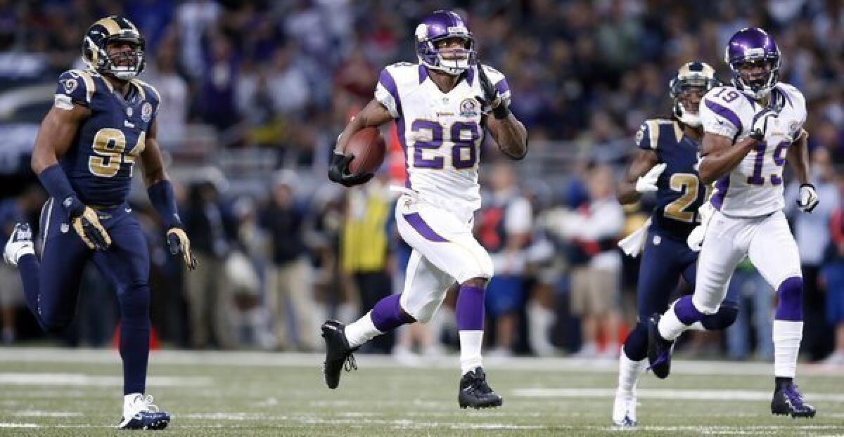 Minnesota Vikings running back Adrian Peterson runs 82 yards for a touchdown Sunday against the St. Louis Rams.