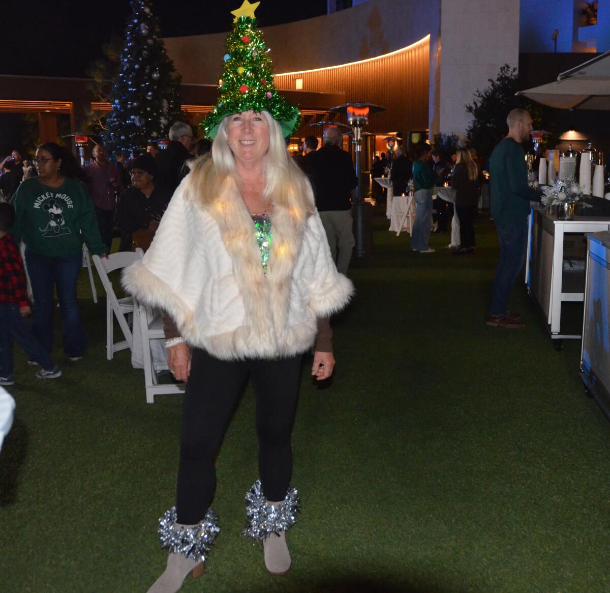 Christmas-costumed Kim Petty came from Sherman Oaks to attend VEA tree-lighting event.