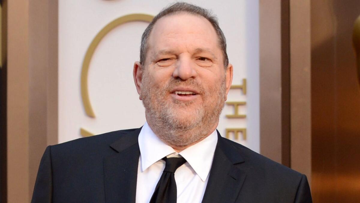 Harvey Weinstein arrives at the Oscars in 2014.