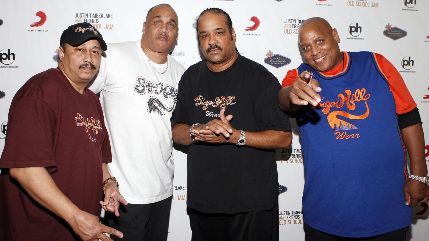 Sugarhill Gang recording artists David 'Davey D' Gunthorpe (L-R) Michael 'Wonder Mike' Wright, Joey 'Master Gee' Robinson and Henry 'Big Bank Hank' Jackson in 2011 in Las Vegas, Nevada. Jackson died Nov. 11, 2014 at the age of 57 after battling cancer.