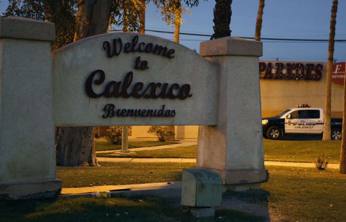 A sign marks the Calexico Port of Entry.