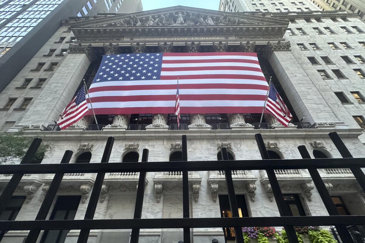 American flag hang from the front of the New York Stock Exchange on Tuesday, Sept. 10, 2024, in New York. 