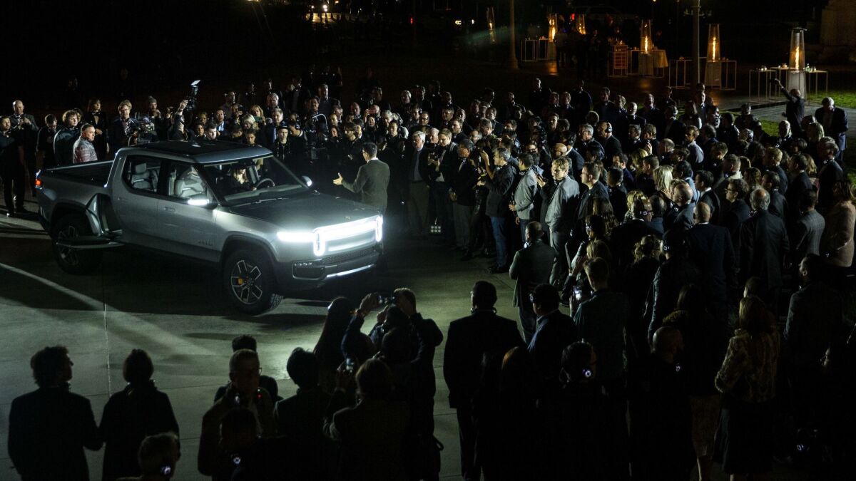 The Rivian R1T electric truck is unveiled at an event at Griffith Observatory in Los Angeles.
