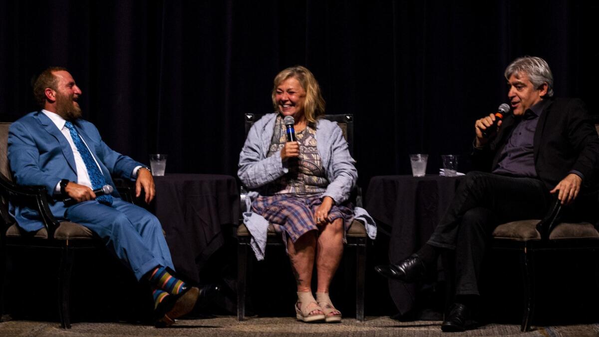 Rabbi Shmuley Boteach, comedian Roseanne Barr, and the editor of the Jewish Journal, David Suissa, participate in a discussion on atonement and repentance.