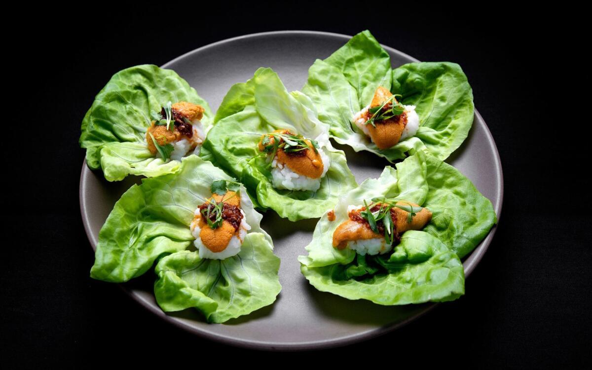 Spicy uni lardo sushi lettuce cups