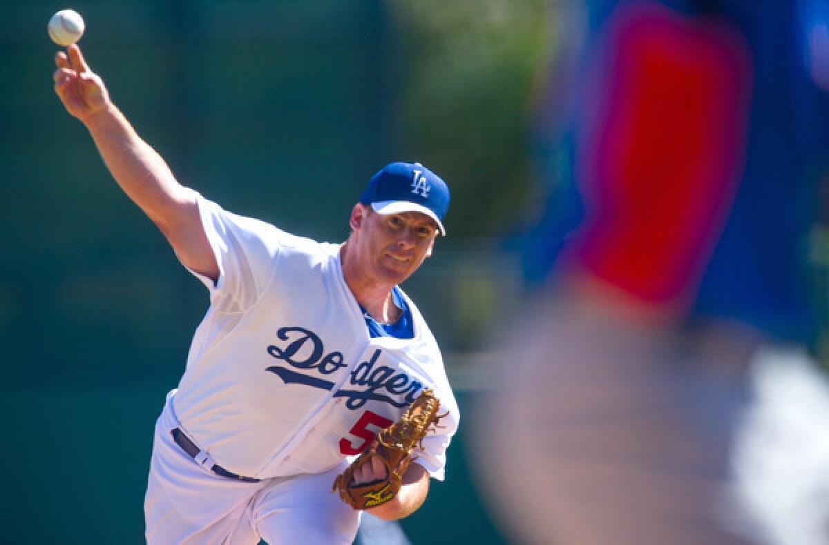 Dodgers starting pitcher Chad Billingsley faces the Chicago Cubs in an exhibition game last month at Camelback Ranch.