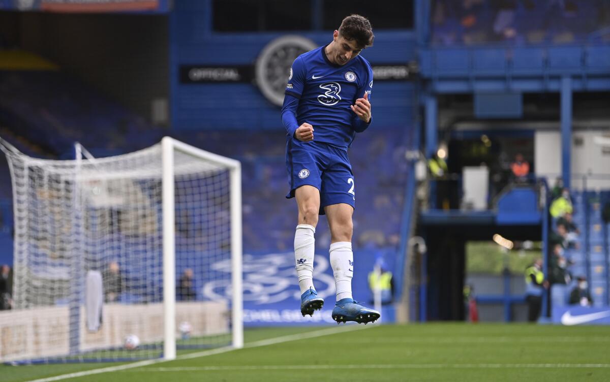 Chelsea's Kai Havertz celebrates after scoring his side's second goal during the English Premier League soccer match between Chelsea and Fulham at Stamford Bridge Stadium in London, Saturday, May 1, 2021. (Justin Setterfield/Pool via AP)