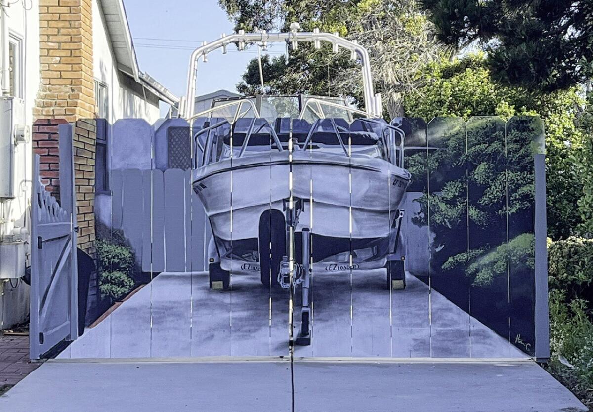 Artist Hanif Panni painted a boat on his neighbor's fence.