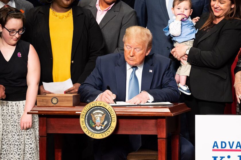 President Donald Trump signs an executive order to advance kidney health, at the Ronald Reagan Building and International Trade Center in Washington, D.C., on Wednesday, July 10, 2019. (Michael Brochstein/Sipa USA/TNS) ** OUTS - ELSENT, FPG, TCN - OUTS **