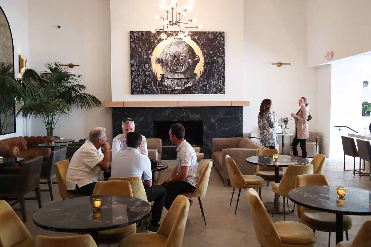 Guests enjoy the new surroundings in the lounge of the newly renovated restaurant and lobby at the Hotel Laguna.