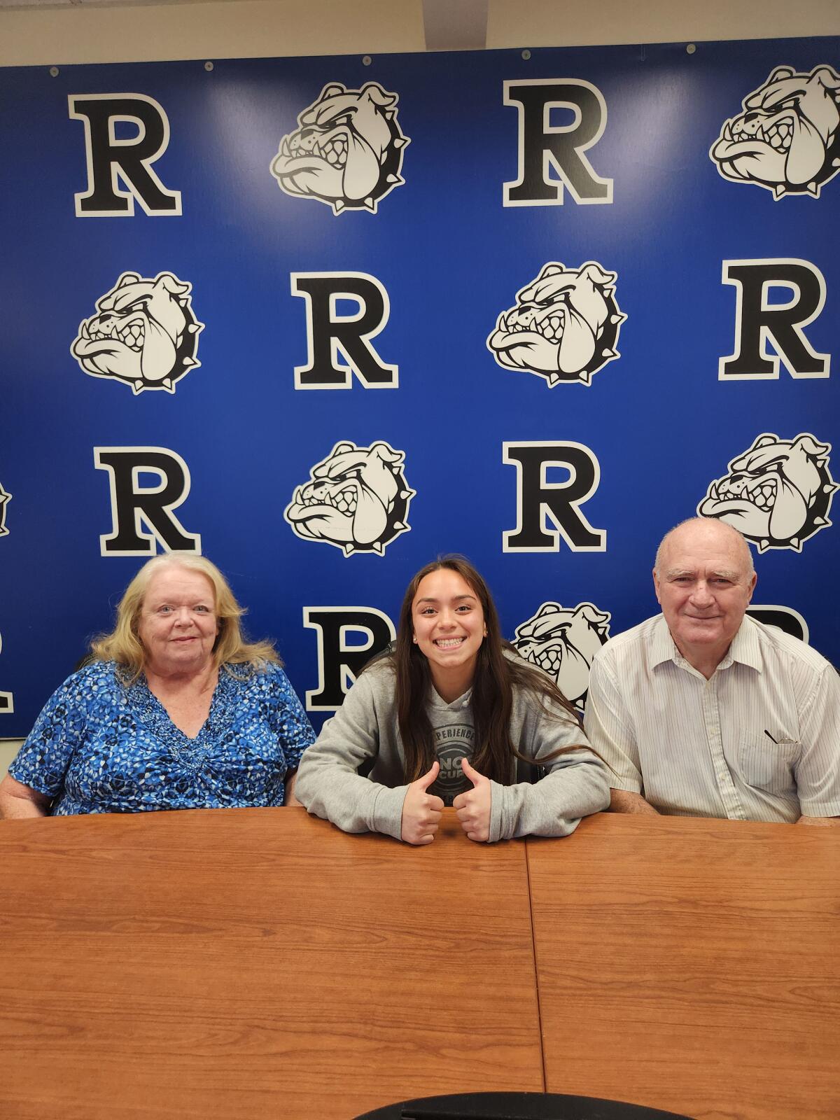 Eva Hernandez-Watsek and her grandparents Beth and Ron Watzek attended signing day on Feb. 13.